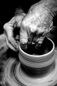 potter's hands and clay