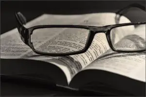 Bible with eyeglasses
